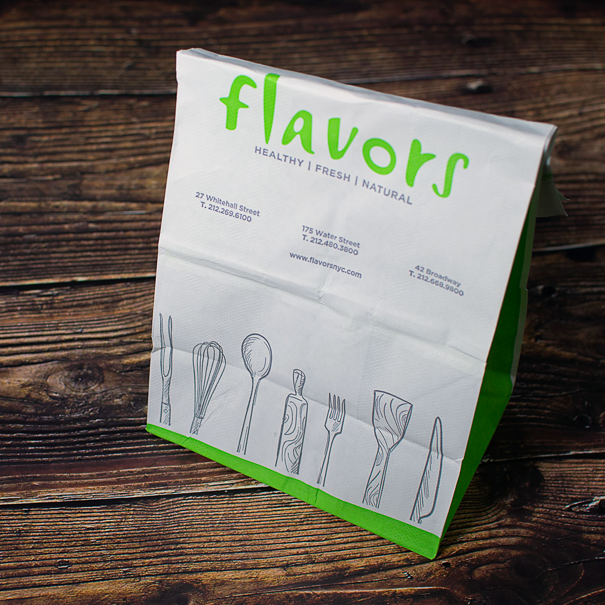 restaurant brand design displayed on paper bag