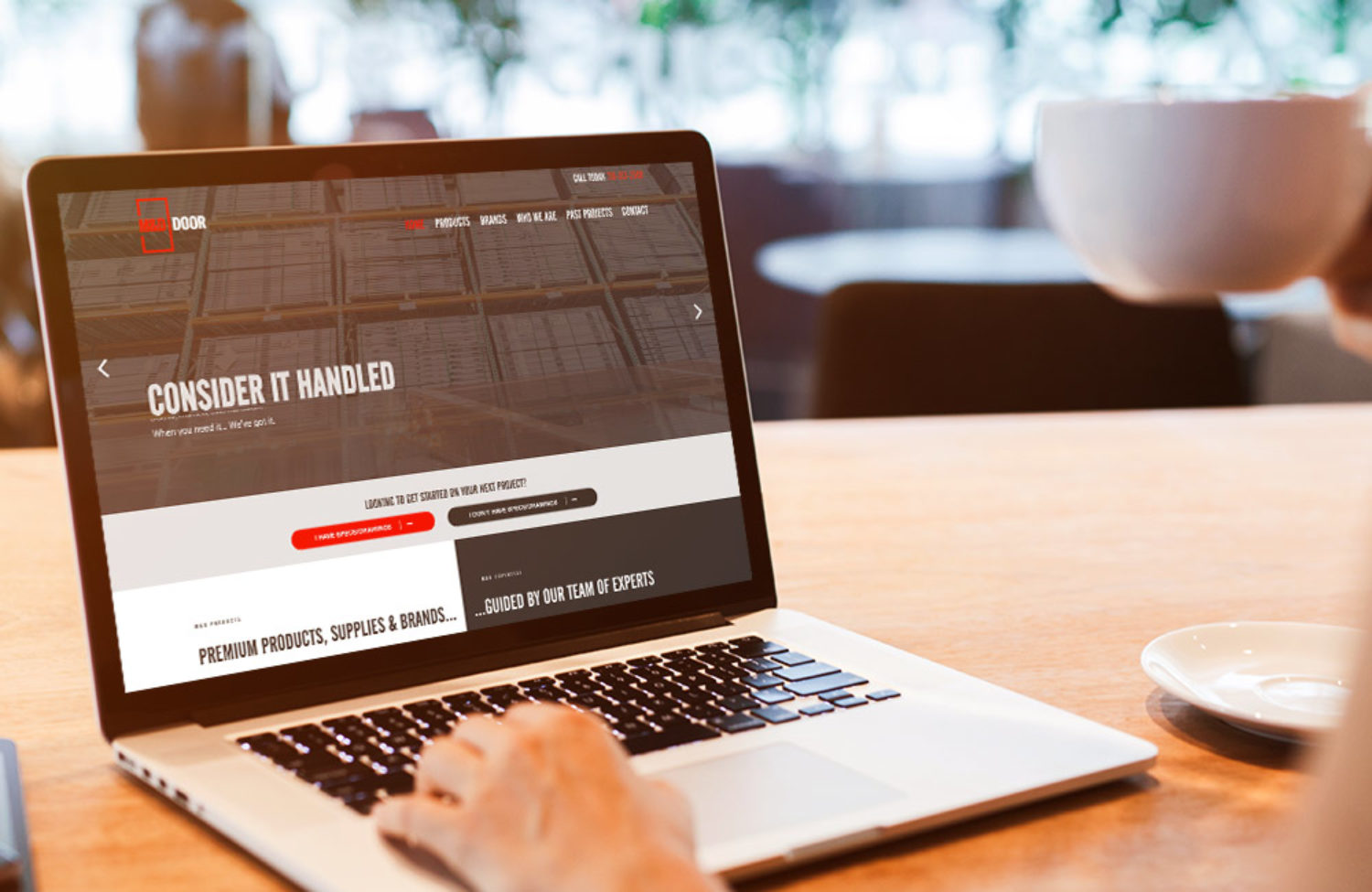 manufacturing web design displayed on a lap top computer screen