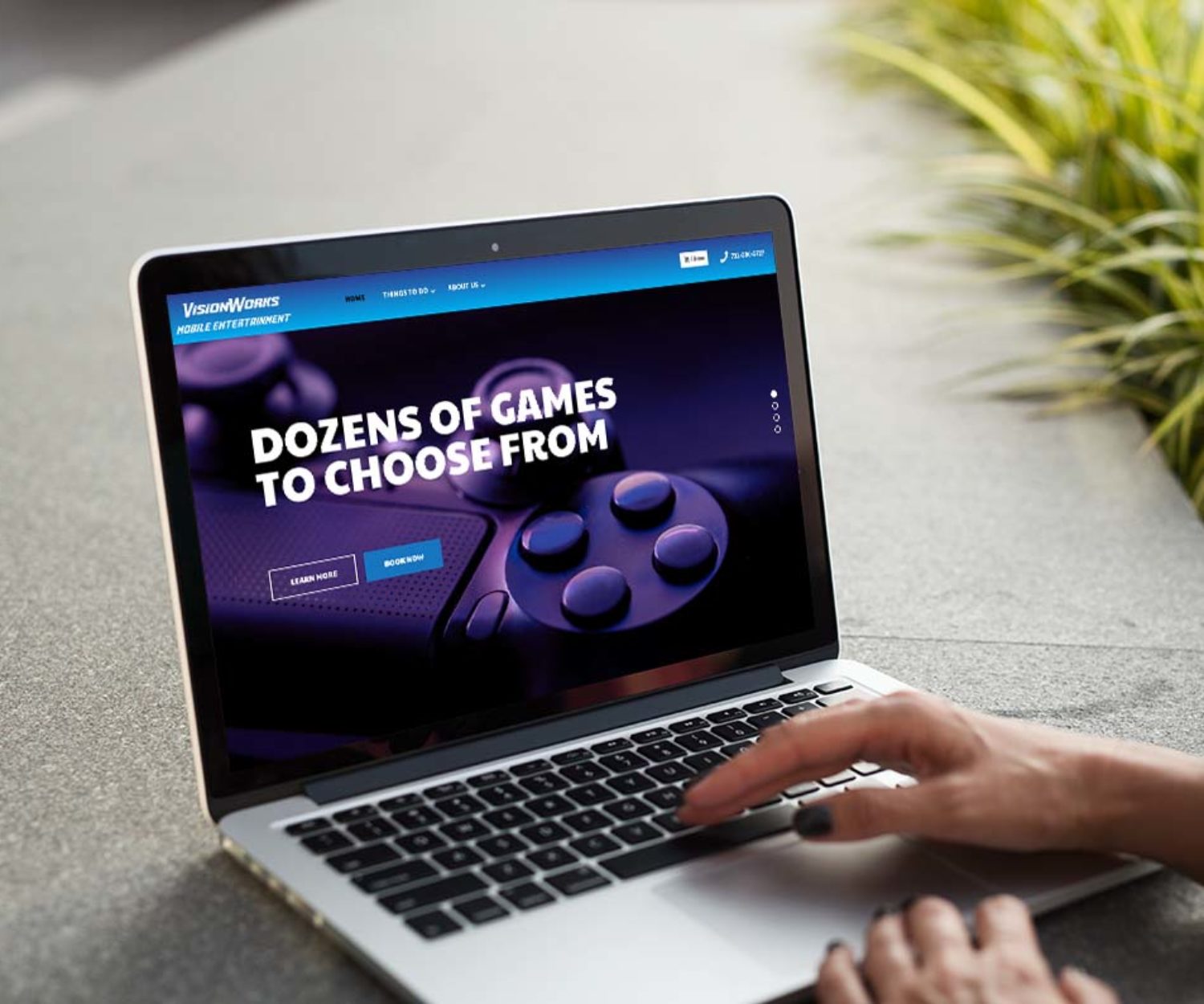 entertainment web design displayed on lap top screen