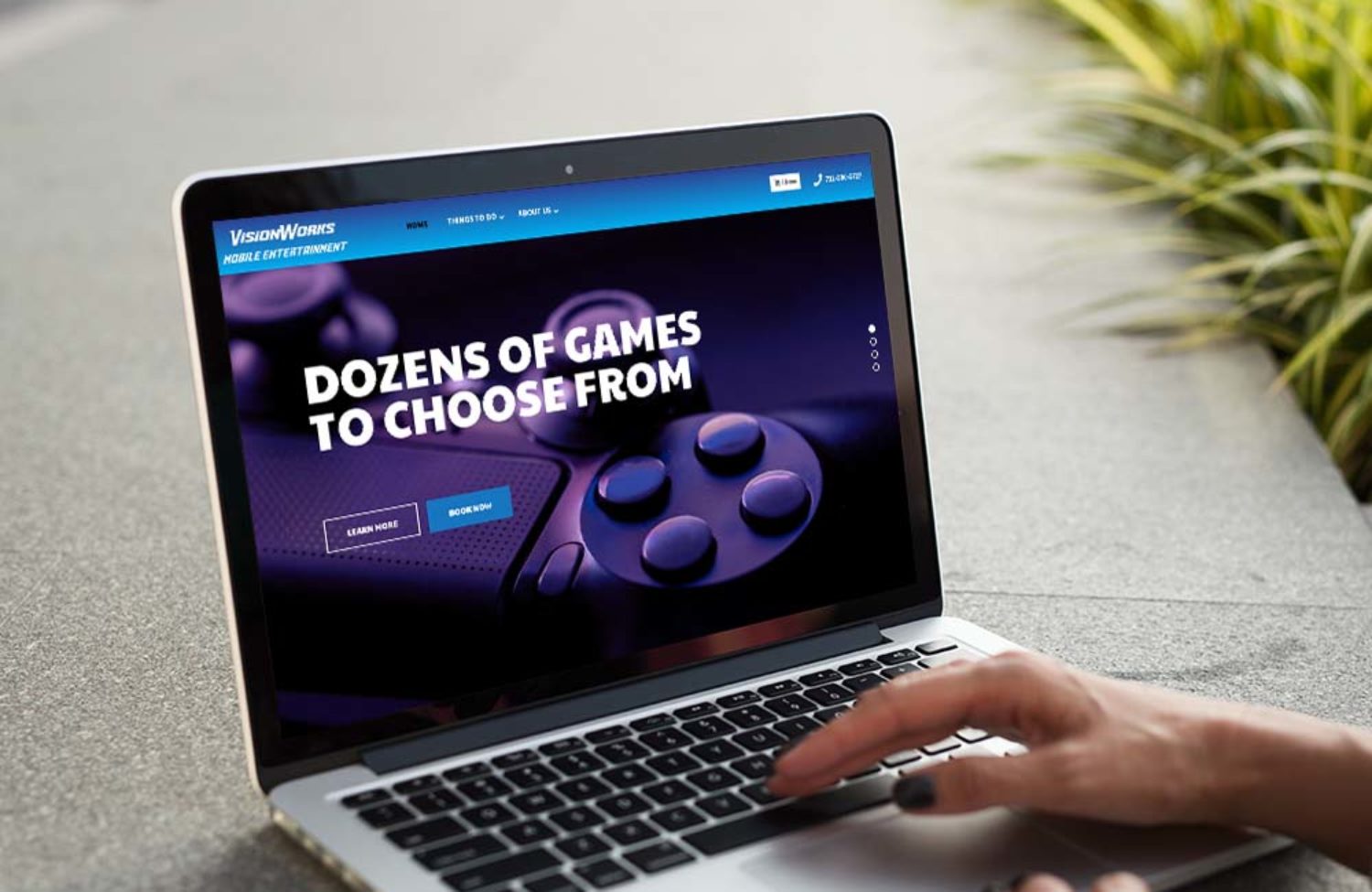 entertainment web design displayed on lap top screen