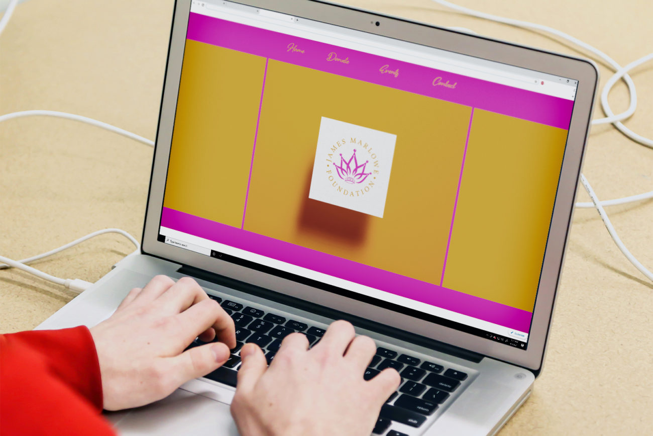 non profit web design displayed on a lap top computer screen