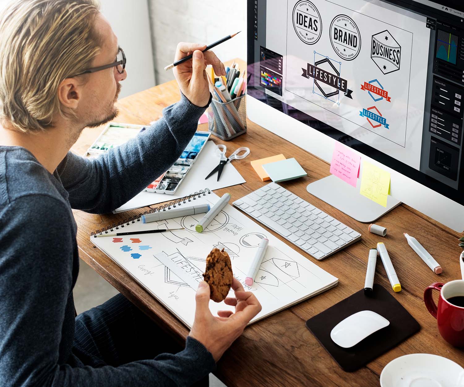 graphic design services displayed on a lap top computer screen