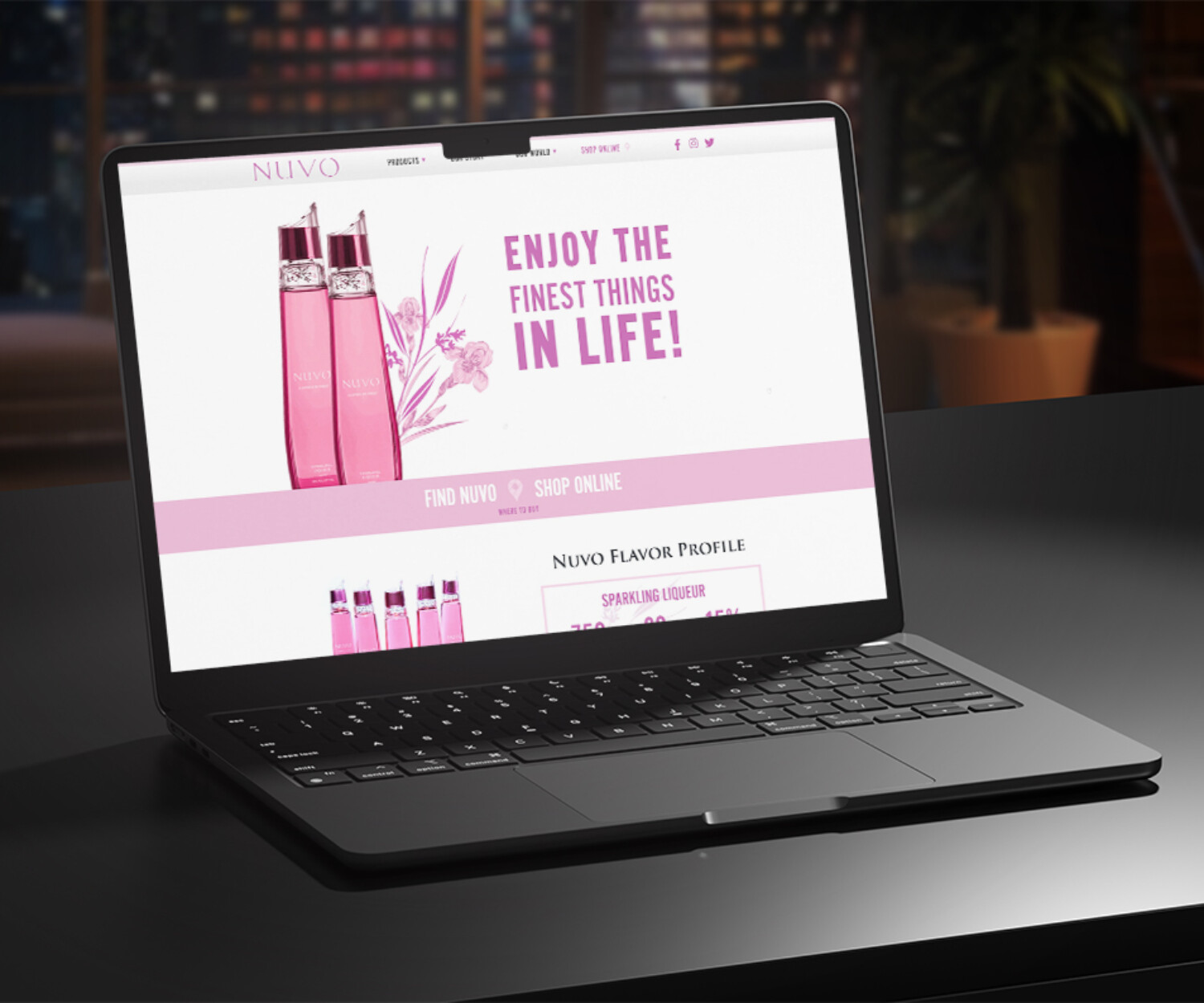 Web design for liquor company displayed on lap top screen