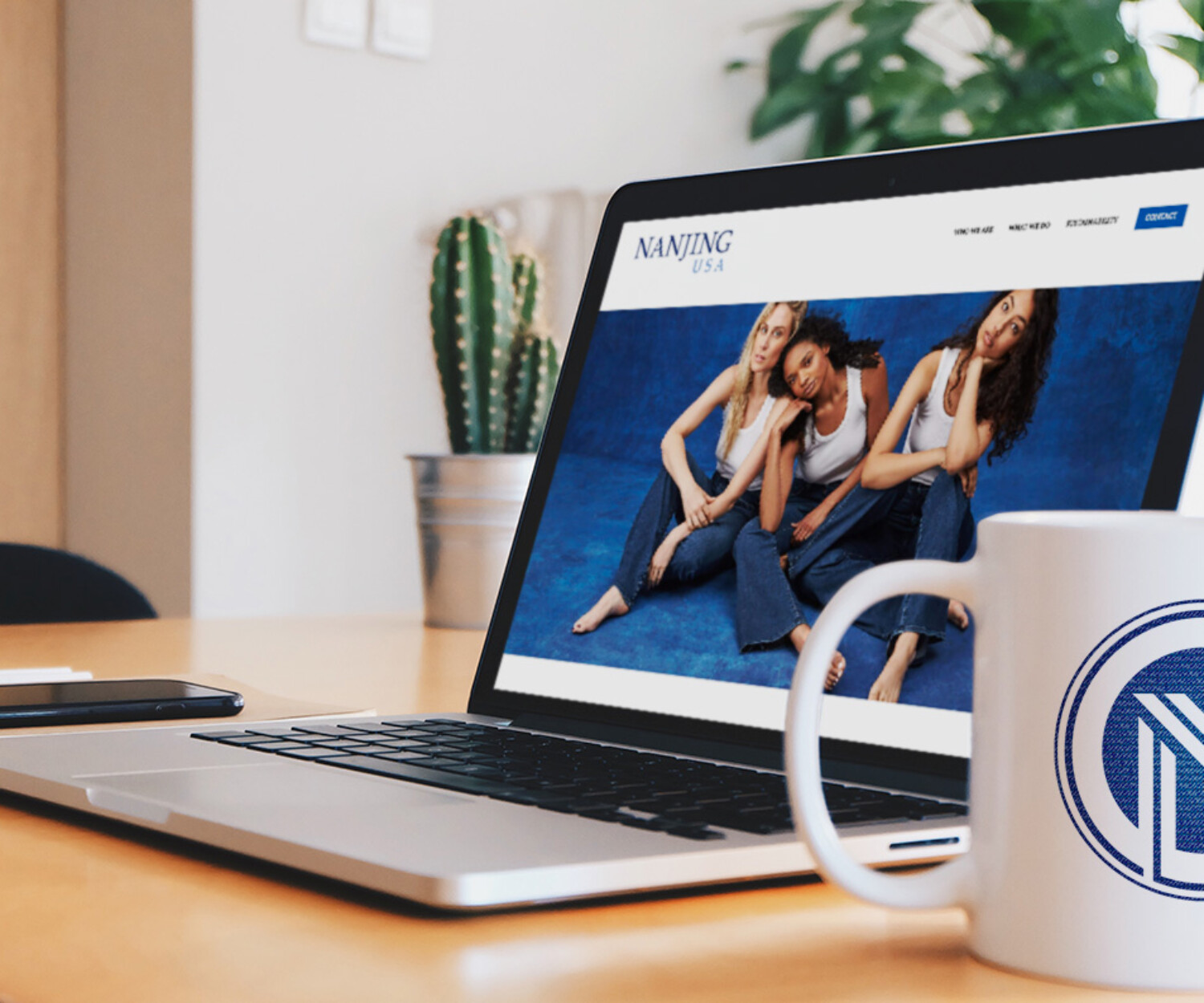 Web design for fashion brand displayed on lap top screen