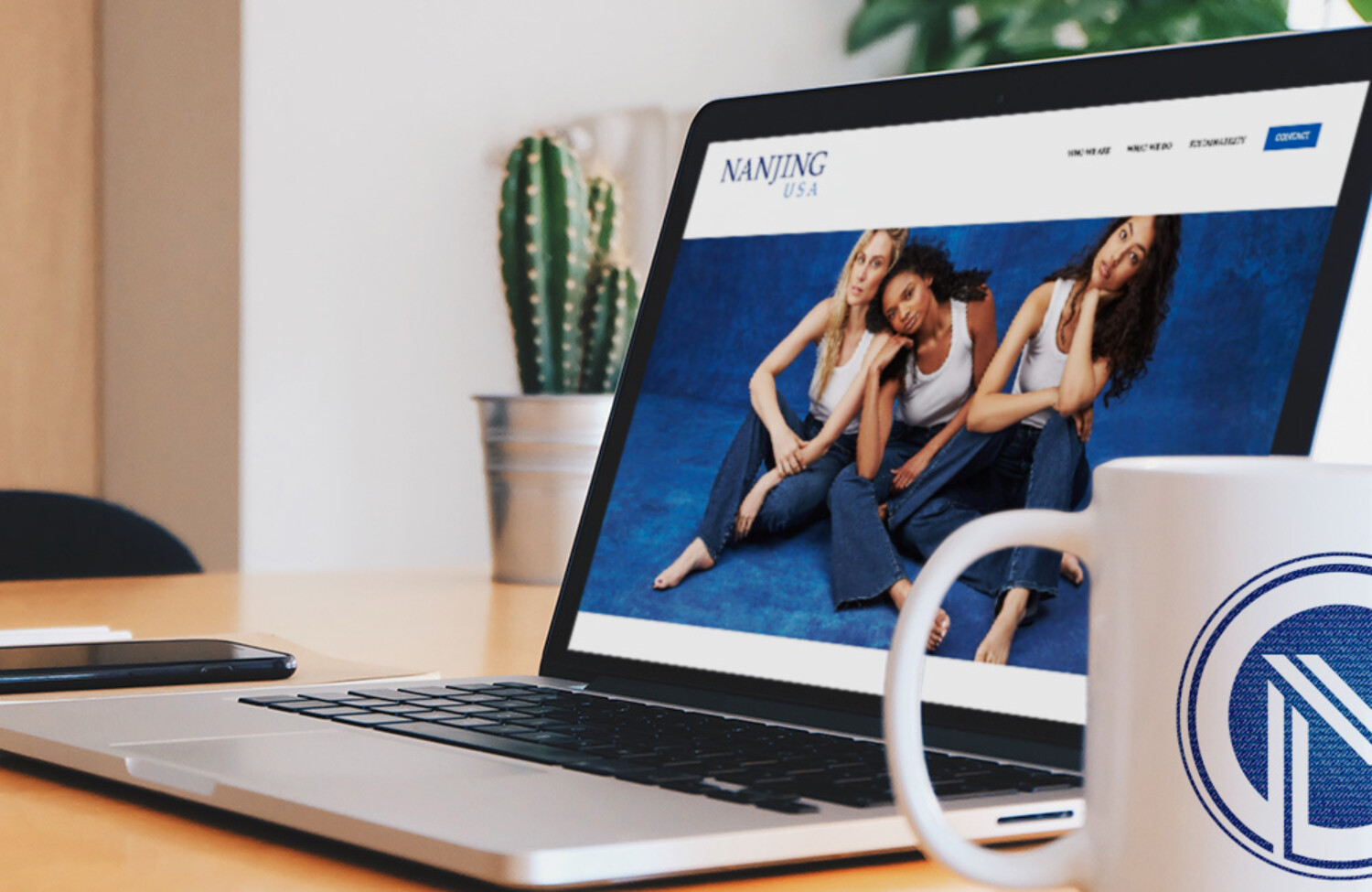 Web design for fashion brand displayed on lap top screen