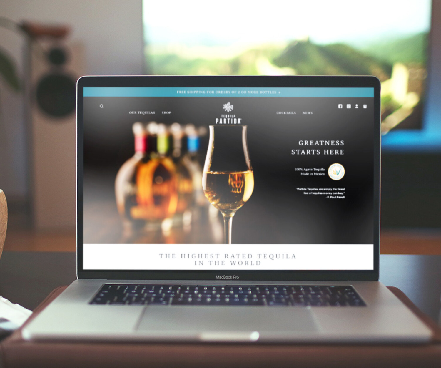 Web design for tequila brand displayed on lap top screen