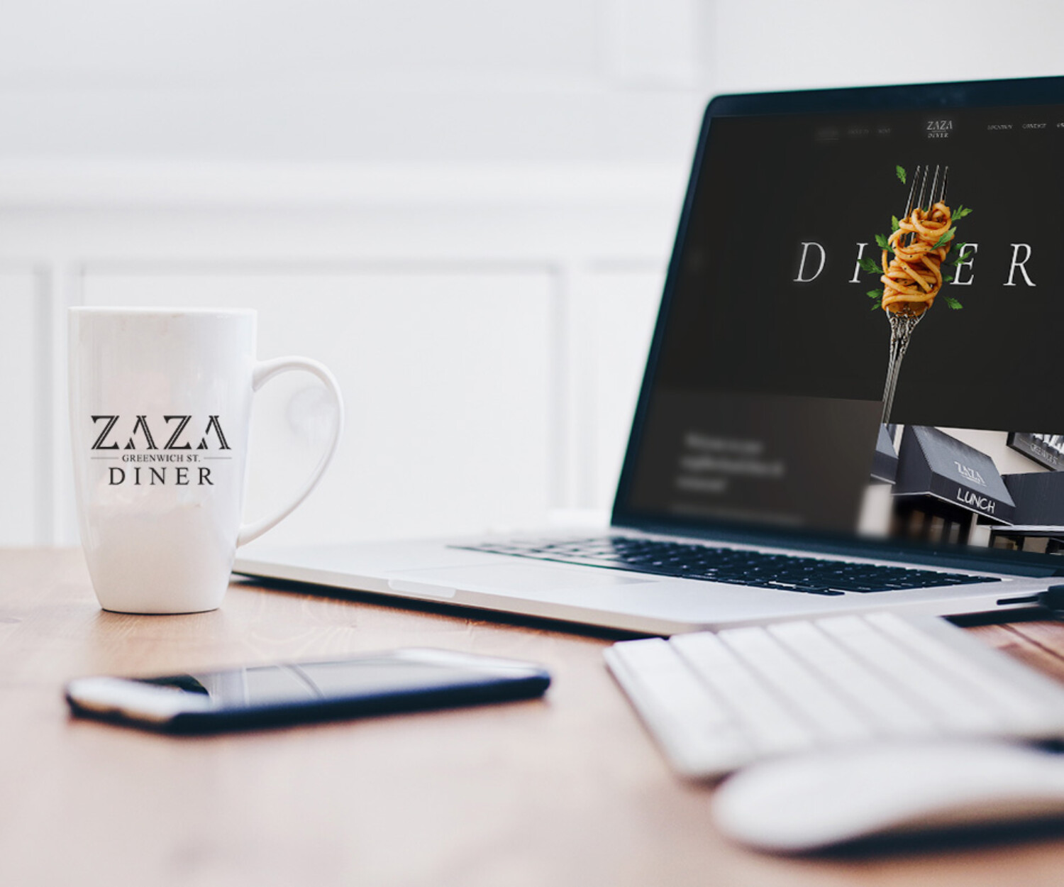 Website design for a diner displayed on a laptop