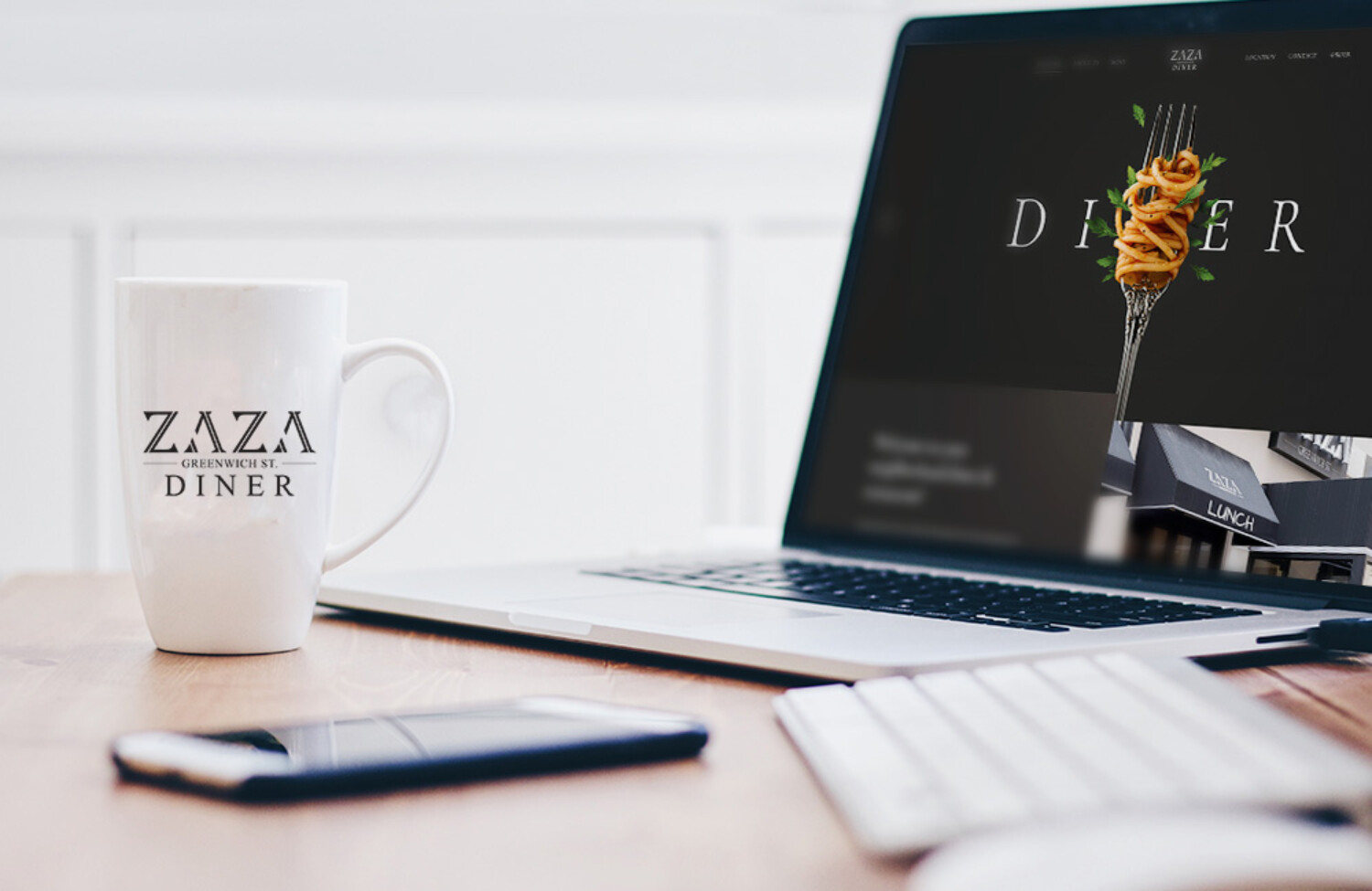 Website design for a diner displayed on a laptop